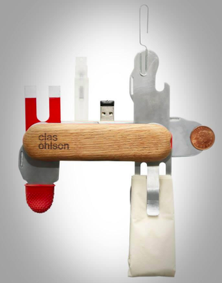 Illustration for article titled A Better Multitool Adds a Napkin Holder, Spritzer, and Flash Drive